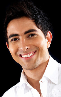 photo of young adult man smiling